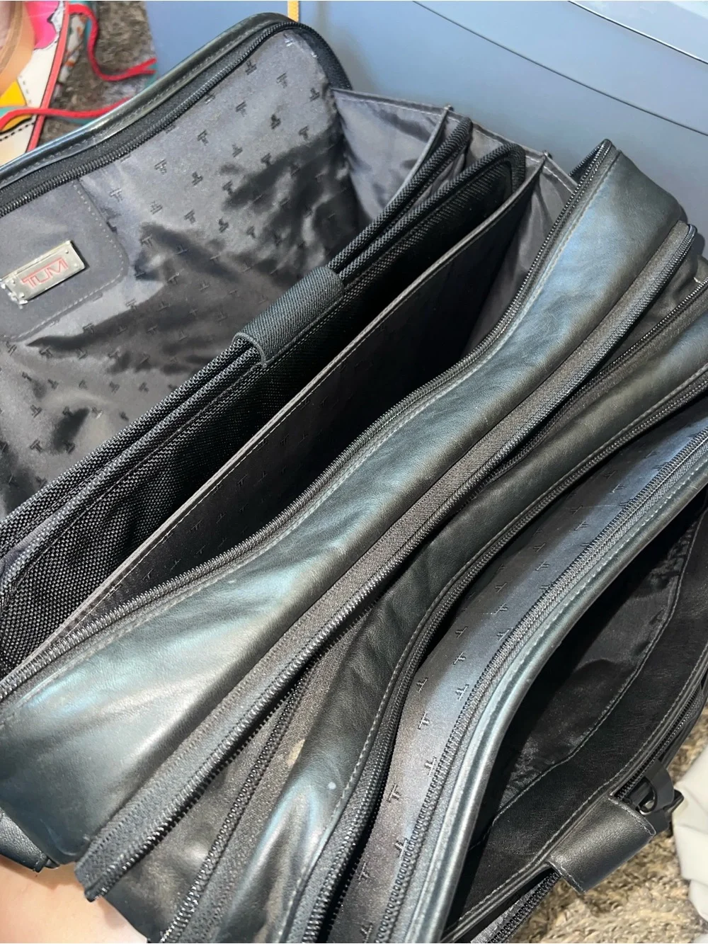 Tumi travel leather briefcase